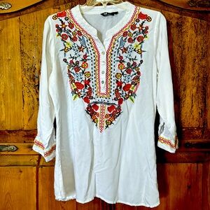 White embroidered tunic top by 64/65